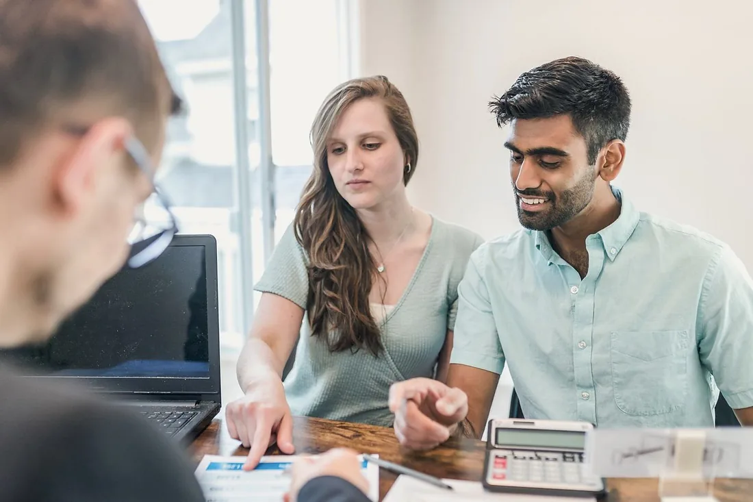 A licensed associate walking a couple through their financial plan